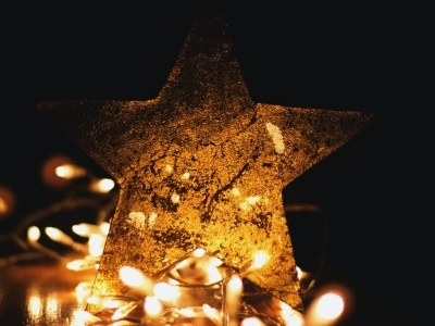Gold star with small lights